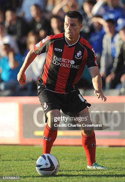 Ian Harte of Bournemouth attacks during the Capital One Cup First Round match between AFC Bournemouth and Portsmouth at The Goldsands Stadium on...