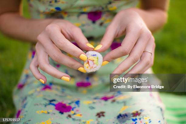 sushi fleur - yellow nail polish stock-fotos und bilder