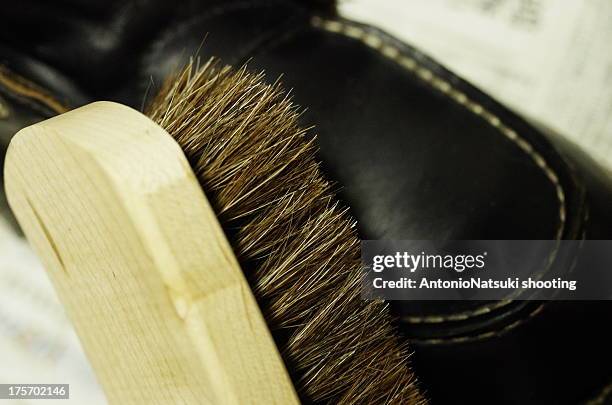 workboots - shoe polish stock pictures, royalty-free photos & images