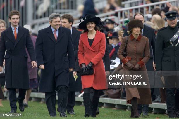 Britain Prince William's girlfriend Kate Middleton arrives at the Sovereign's Parade at The Royal Military Academy in Camberley, west of London, 15...