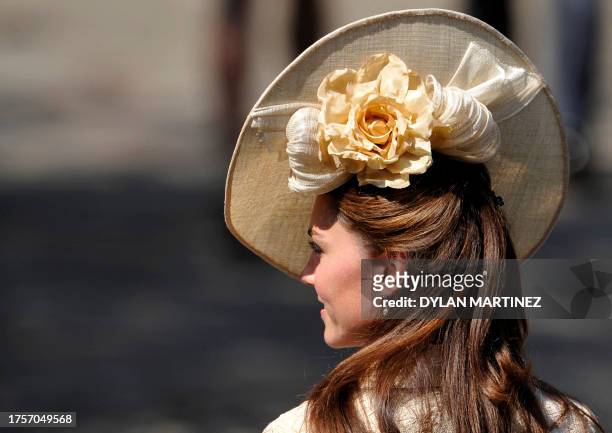 Britain's Catherine, Duchess of Cambridge, arrives for the wedding between England rugby player Mike Tindall and Zara Phillips, the eldest...