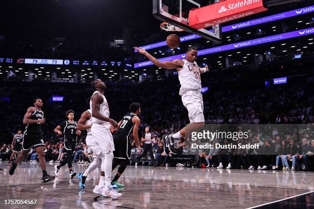 Isaac Okoro of the Cleveland Cavaliers dunks the ball during the third quarter of the game against the Brooklyn Nets at Barclays Center on October...