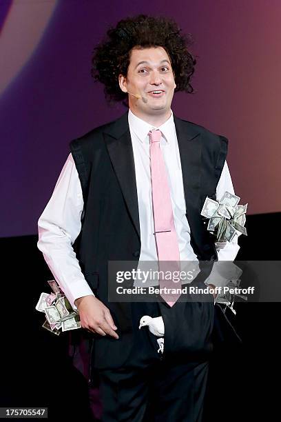 Magician Eric Antoine performs in his show "Le mix sous les etoiles" on day 7 of the 29th Ramatuelle Festival on August 6, 2013 in Ramatuelle, France.