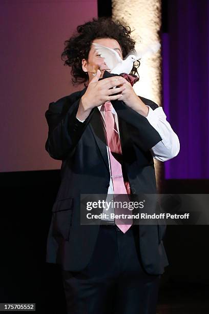 Magician Eric Antoine performs in his show "Le mix sous les etoiles" on day 7 of the 29th Ramatuelle Festival on August 6, 2013 in Ramatuelle, France.