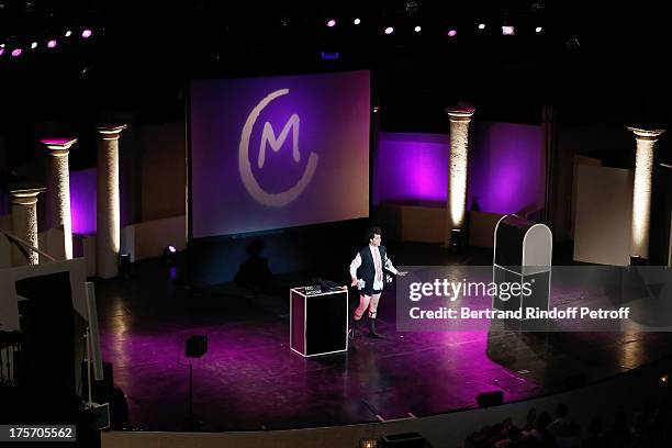 Magician Eric Antoine performs in his show "Le mix sous les etoiles" on day 7 of the 29th Ramatuelle Festival on August 6, 2013 in Ramatuelle, France.