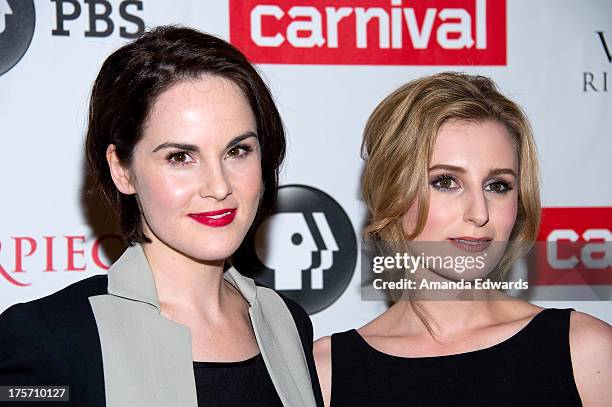 Actresses Michelle Dockery and Laura Carmichael arrive at the "Downton Abbey" photo call at The Beverly Hilton Hotel on August 6, 2013 in Beverly...