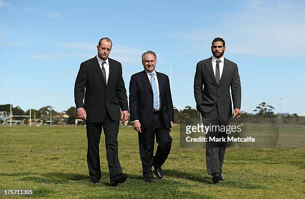 Rabbitohs coach Michael Maguire, Federal Minister for Sport Senator Don Farrell and Greg Inglis pose during a South Sydney Rabbitohs NRL media...