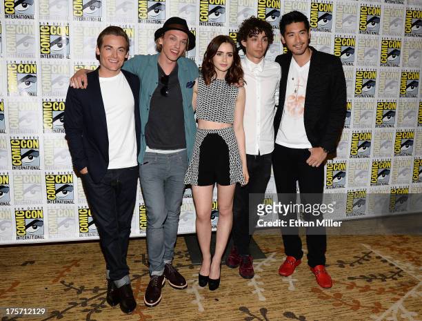 Actors Kevin Zegers and Jamie Campbell Bower, actress Lily Collins, and actors Robert Sheehan and Godfrey Gao attend "The Mortal Instruments: City of...