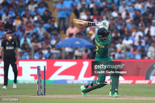 Rassie van der Dussen of South Africa bowled out by New Zealand's Tim Southee during the ICC Men's Cricket World Cup 2023 match between South Africa...