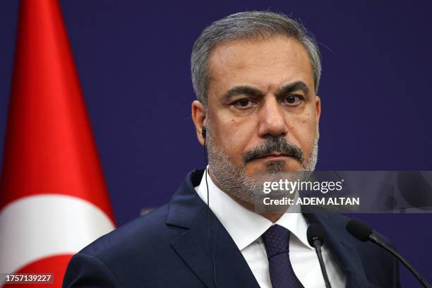 Turkish Foreign Minister Hakan Fidan looks during a press conference with his Iranian counterpart Hossein Amir-Abdollahian at the Ministry of Foreign...