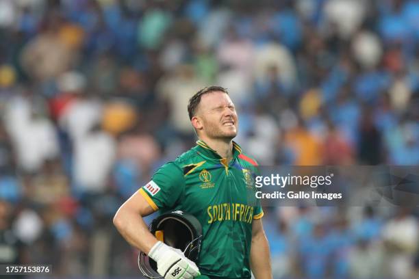 David Miller of South Africa makes their way off after being dismissed during the ICC Men's Cricket World Cup 2023 match between South Africa and New...