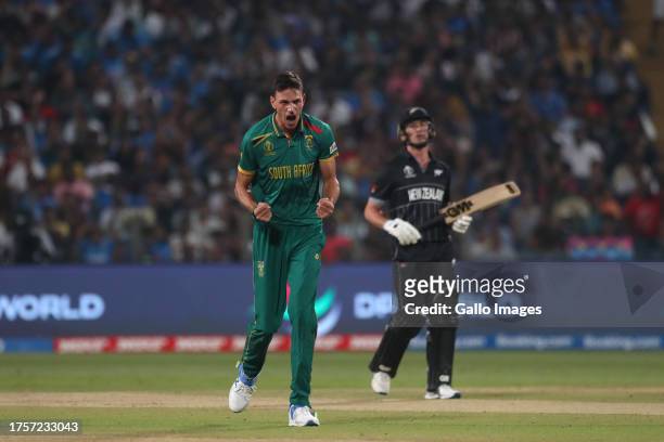 Marco Jansen of South Africa celebrates the wicket of New Zealand's Devon Conway during the ICC Men's Cricket World Cup 2023 match between South...