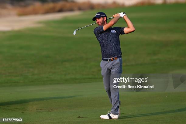 Scott Jamieson of Scotland plays his second shot on the 15th hole during Day One of the Commercial Bank Qatar Masters at Doha Golf Club on October...