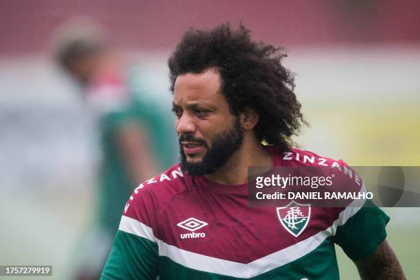 Fluminense's defender Marcelo takes part in a training session ahead of the Libertadores Cup final football match against Argentina's Boca Juniors,...
