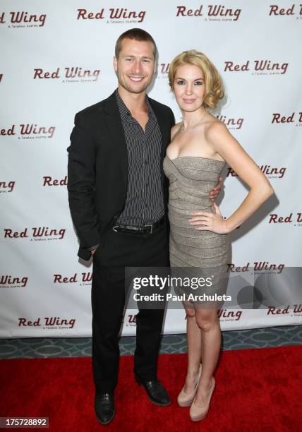 Actors Glen Powell and Breann Johnson attend the premiere of "Red Wing" at Harmony Gold Theatre on August 6, 2013 in Los Angeles, California.