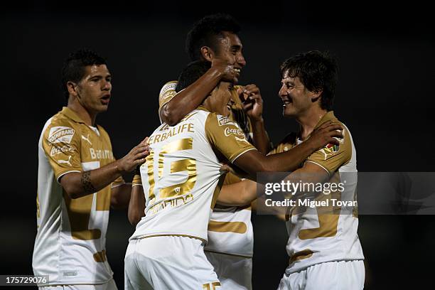 Candido Ramirez ans his teammates of Pumas celebrates a goal against Leones Negros during a match between Pumas and Leones Negros as part of the Copa...