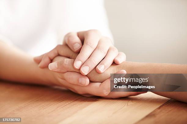 we can get through this together - consoling hands stock pictures, royalty-free photos & images