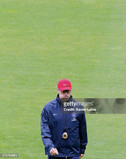 Head coach Laurent Blanc of Paris Saint-Germain react during a training session at Clairefontaine training center on August 07, 2013 in...