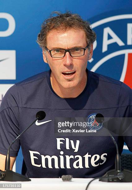 Head coach Laurent Blanc of Paris Saint-Germain speaks during a press conference at Clairefontaine training center on August 07, 2013 in...