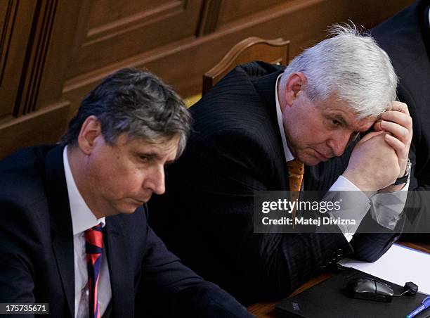 Czech Prime Minister Jiri Rusnok and Czech Finance Minister Jan Fischer attend a confidence vote at the Czech Chamber of Deputies on August 7, 2013...