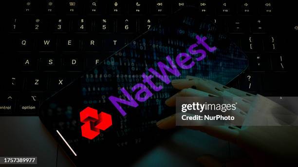 NatWest logo is seen on the screen of a mobile device in this photo illustration taken on 01 November, 2023 in Warsaw, Poland.