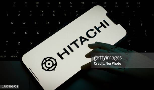 Hitachi logo is seen on the screen of a mobile device in this photo illustration taken on 01 November, 2023 in Warsaw, Poland.