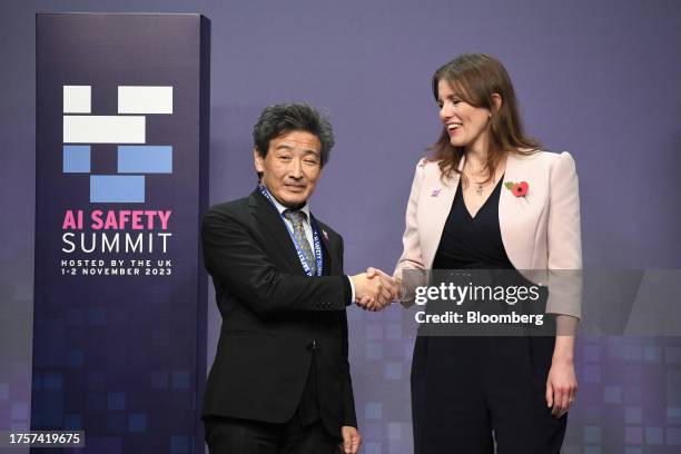 Yoichi Iida, Japan's director of policy at the ministry of internal affairs and communications, left, with Michelle Donelan, UK science, innovation...