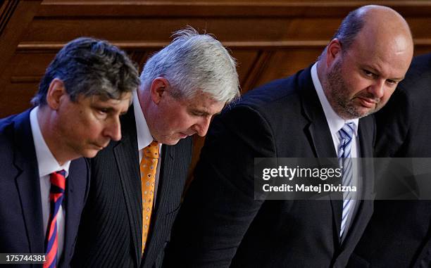 Czech Minister of Finance Jan Fischer , Czech Prime Minister Jiri Rusnok and Czech Minister of Interior Martin Pecina attend a confidence vote at the...