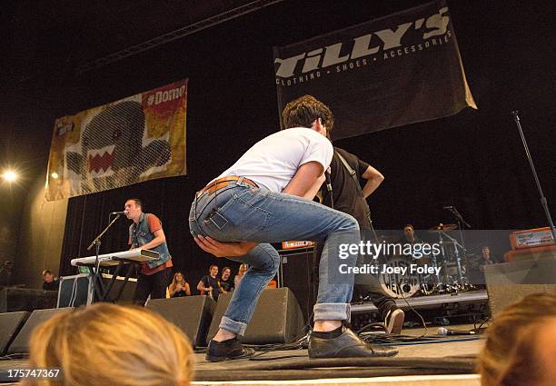 Vocalist Zachary David Porter of Allstar Weekend performs onstage during the 2013 Van Warped Tour at Riverbend Music Center on July 30, 2013 in...
