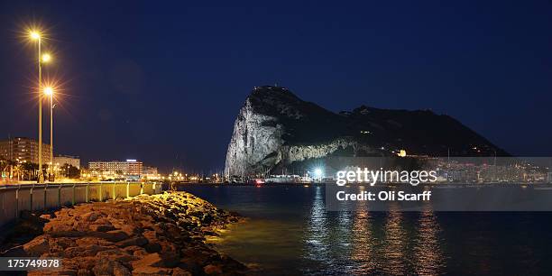 The Rock of Gibraltar is illuminated at night on August 7, 2013 in La Linea de la Concepcion, Spain. David Cameron and his Spanish counterpart,...