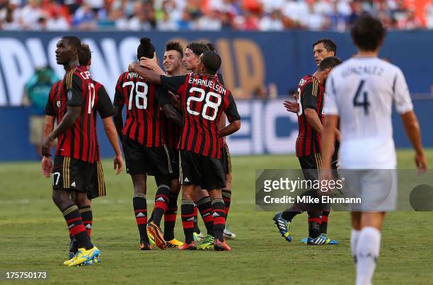 Mbaye Niang of AC Milan is congratulated after scoring a goal against the Los Angeles Galaxy during the International Champions Cup Third Place Match...