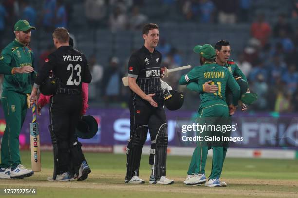 OPUNE, INDIA South Africa team members celebrate their team's win over New Zealand during the ICC Men's Cricket World Cup 2023 match between South...