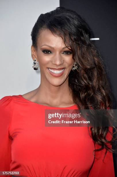 Actress Judi Shekoni arrives at the premiere of TriStar Pictures' "Elysium" at Regency Village Theatre on August 7, 2013 in Westwood, California.