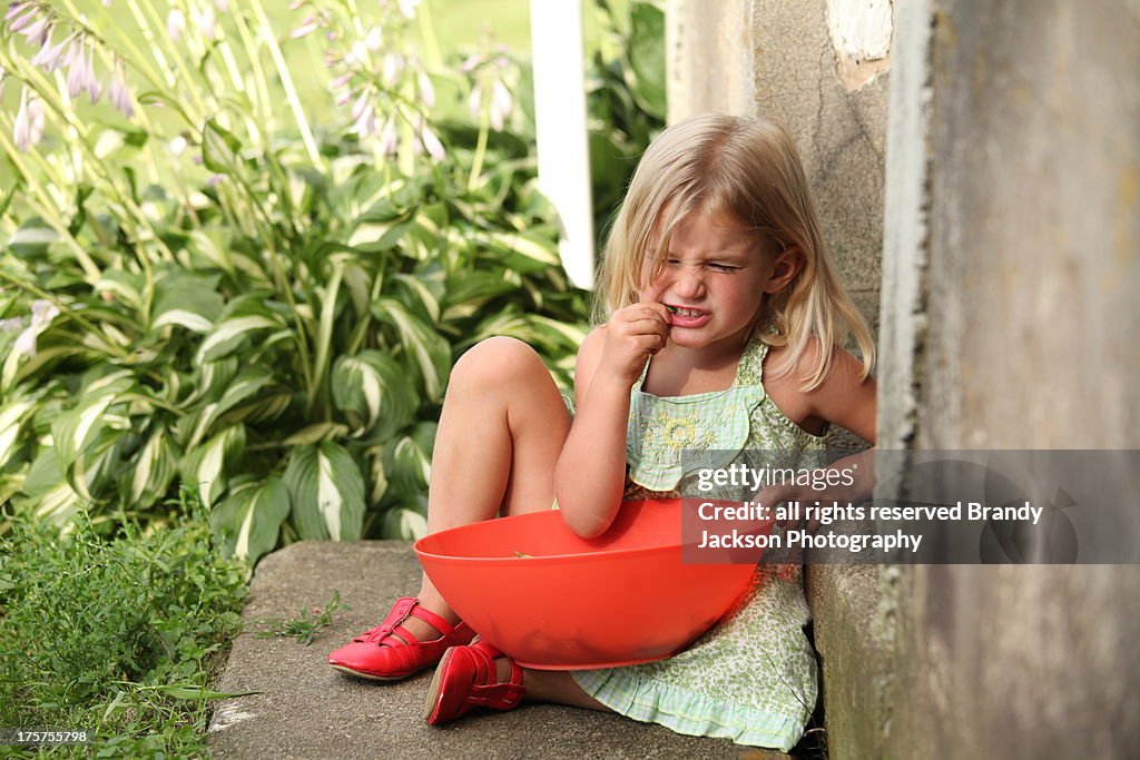 Girl eating beans