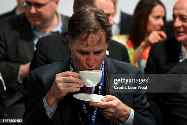 Nick Clegg, President, Global Affairs for Meta, drinks from a cup on Day 1 of the AI Safety Summit at Bletchley Park on November 1, 2023 in...