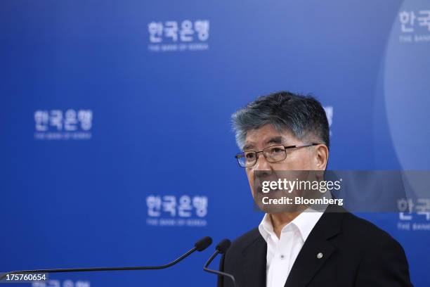 Kim Choong Soo, governor of the Bank of Korea, speaks during a news conference following a monetary policy meeting at the central bank's headquarters...