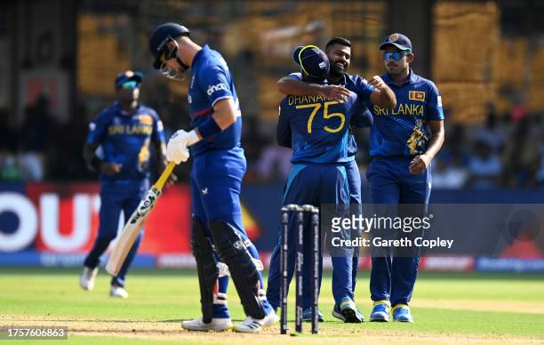 Lahiru Kumara of Sri Lanka celebrates the wicket of Liam Livingstone of England during the ICC Men's Cricket World Cup India 2023 between England and...