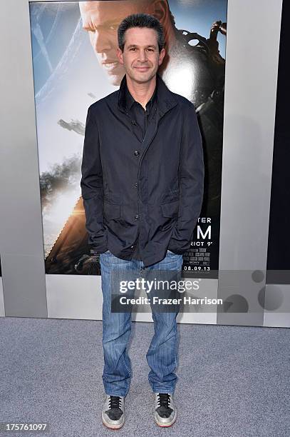 Producer Simon Kinberg arrives at the premiere of TriStar Pictures' "Elysium" at Regency Village Theatre on August 7, 2013 in Westwood, California.