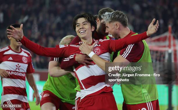 Ao Tanaka of Düsseldorf celebrates his goal to the 4:3 victory during the Second Bundesliga match between Fortuna Düsseldorf and 1. FC Kaiserslautern...