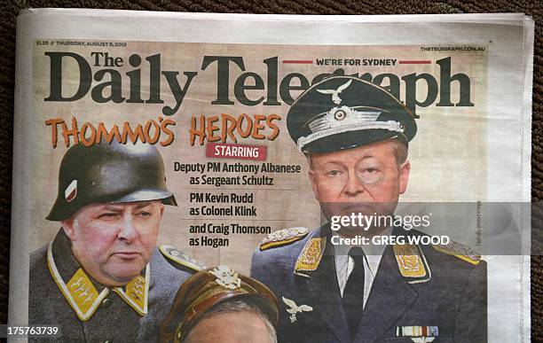 In this photo showing the front page of media tycoon Rupert Murdoch's key tabloid, the Sydney Daily Telegraph, on August 8 Australian Prime Minister...