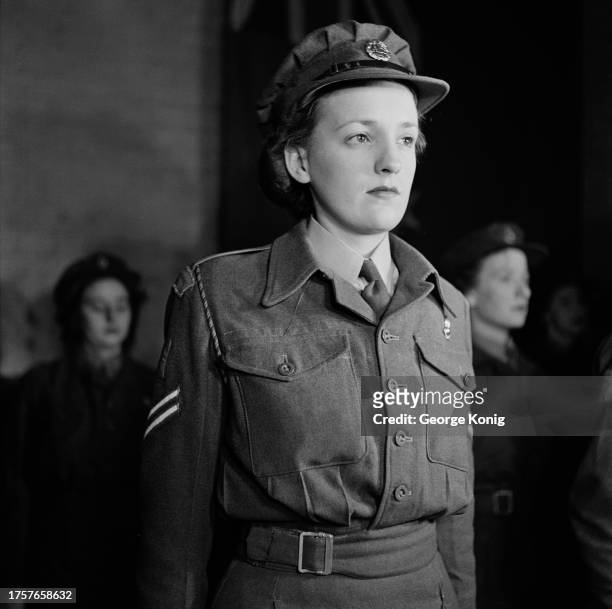 British Territorial Army officer Corporal Matthews, a clerk in the War Office typing pool at Felthamm of the 607 Searchlight Regiment, RA , at the...