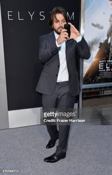 Actor Diego Luna arrives at the Premiere of TriStar Pictures' "Elysium" oat Regency Village Theatre on August 7, 2013 in Westwood, California.