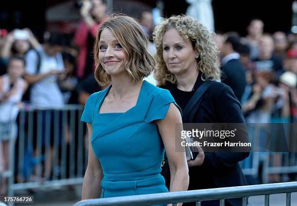 Actress Jodie Foster arrives at the Premiere of TriStar Pictures' "Elysium" oat Regency Village Theatre on August 7, 2013 in Westwood, California.