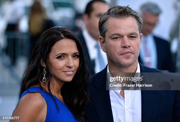 Actor Matt Damon and wife Luciana Damon arrive at the premiere of TriStar Pictures' 'Elysium' at Regency Village Theatre on August 7, 2013 in...