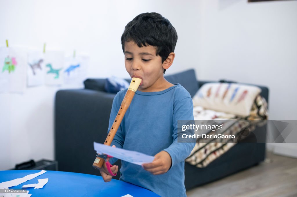 Small child doing activities at home