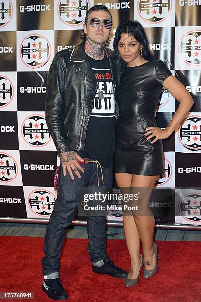 Rapper Yelawolf and Fefe Dobson attend G-Shock - Shock The World 2013 at Basketball City - Pier 36 - South Street on August 7, 2013 in New York City.
