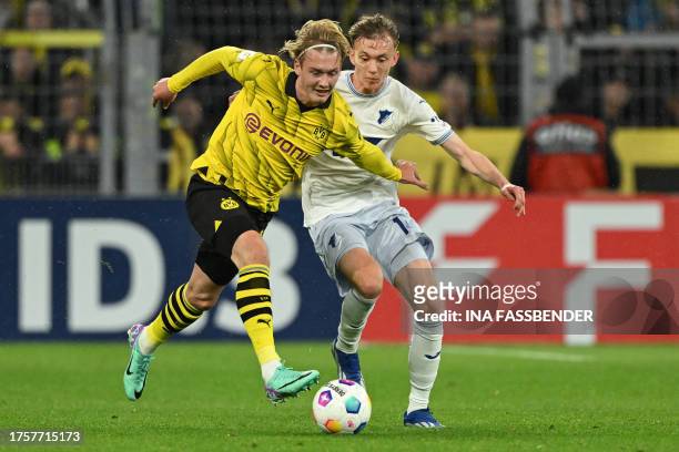 Dortmund's German midfielder Julian Brandt and Hoffenheim's German forward Maximilian Beier vie for the ball during the German Cup second round...