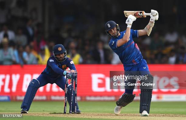 Mark Wood of England is stumped by Kusal Mendis of Sri Lanka during the ICC Men's Cricket World Cup India 2023 between England and Sri Lanka at M....