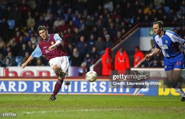 Gareth Barry of Aston Villa scores their third goal during the FA Barclaycard Premiership match between Aston Villa and Blackburn Rovers at Villa...