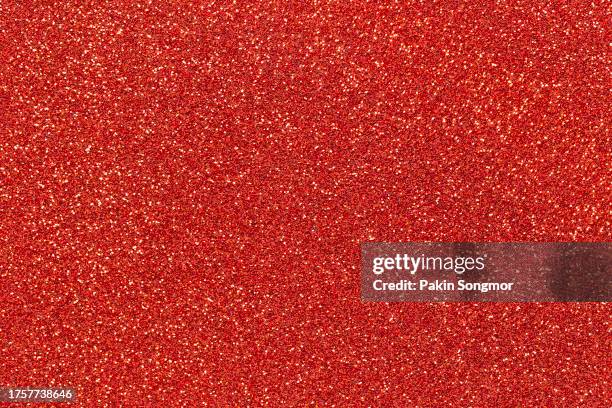 red color glitter texture christmas abstract background. - red glitter paper stock pictures, royalty-free photos & images